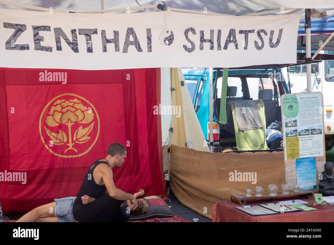 Lady at Byron Bay market having zen thai shiatsu massage therapy, Byron