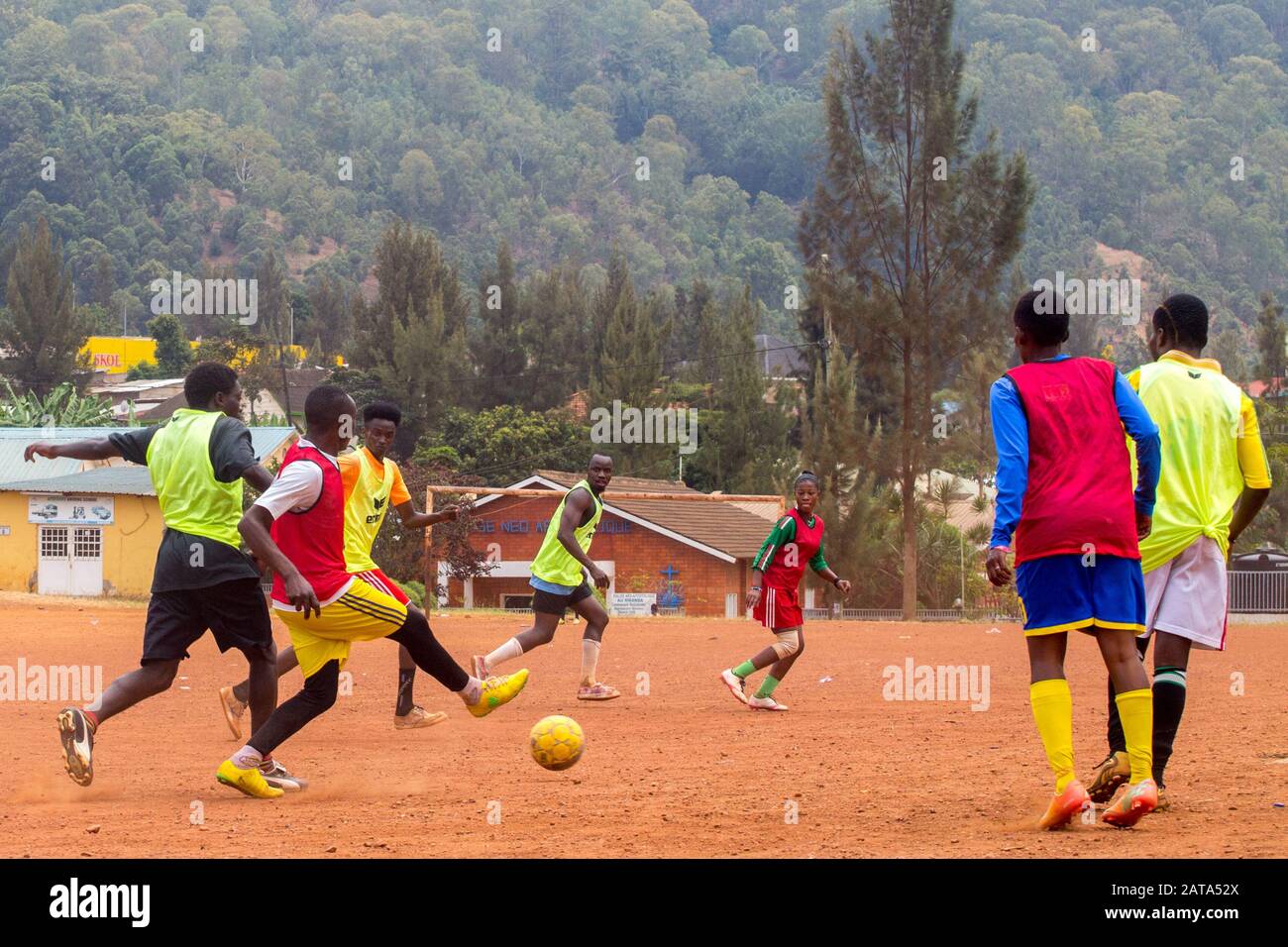 Girls playing soccer at a playground opposite Centre Culturel Islamique Nyamirambo (Kwa kadhafi) in Kigali, Rwanda. Stock Photo