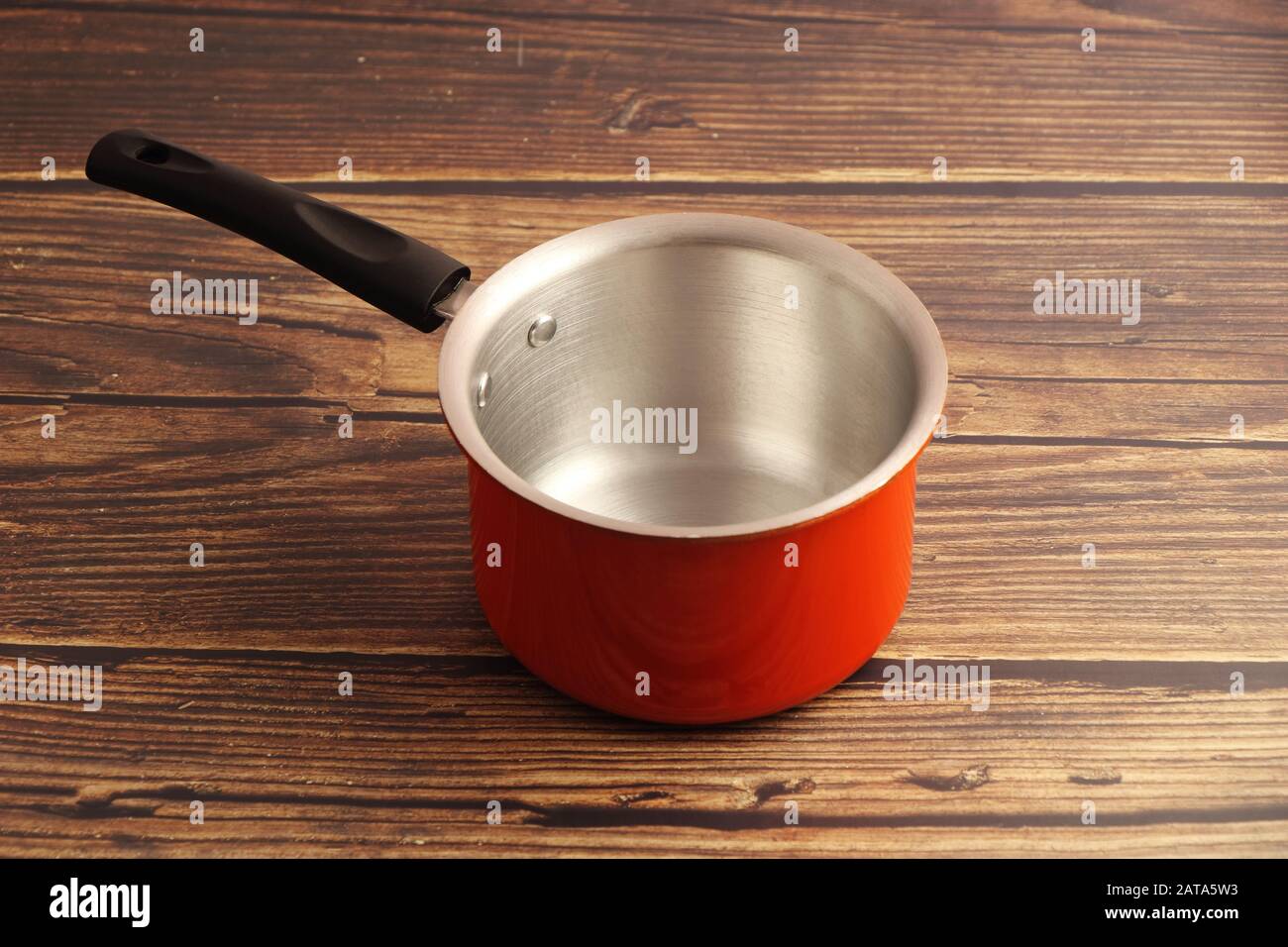 Indian made Aluminum cooking pan isolated on white background Stock Photo