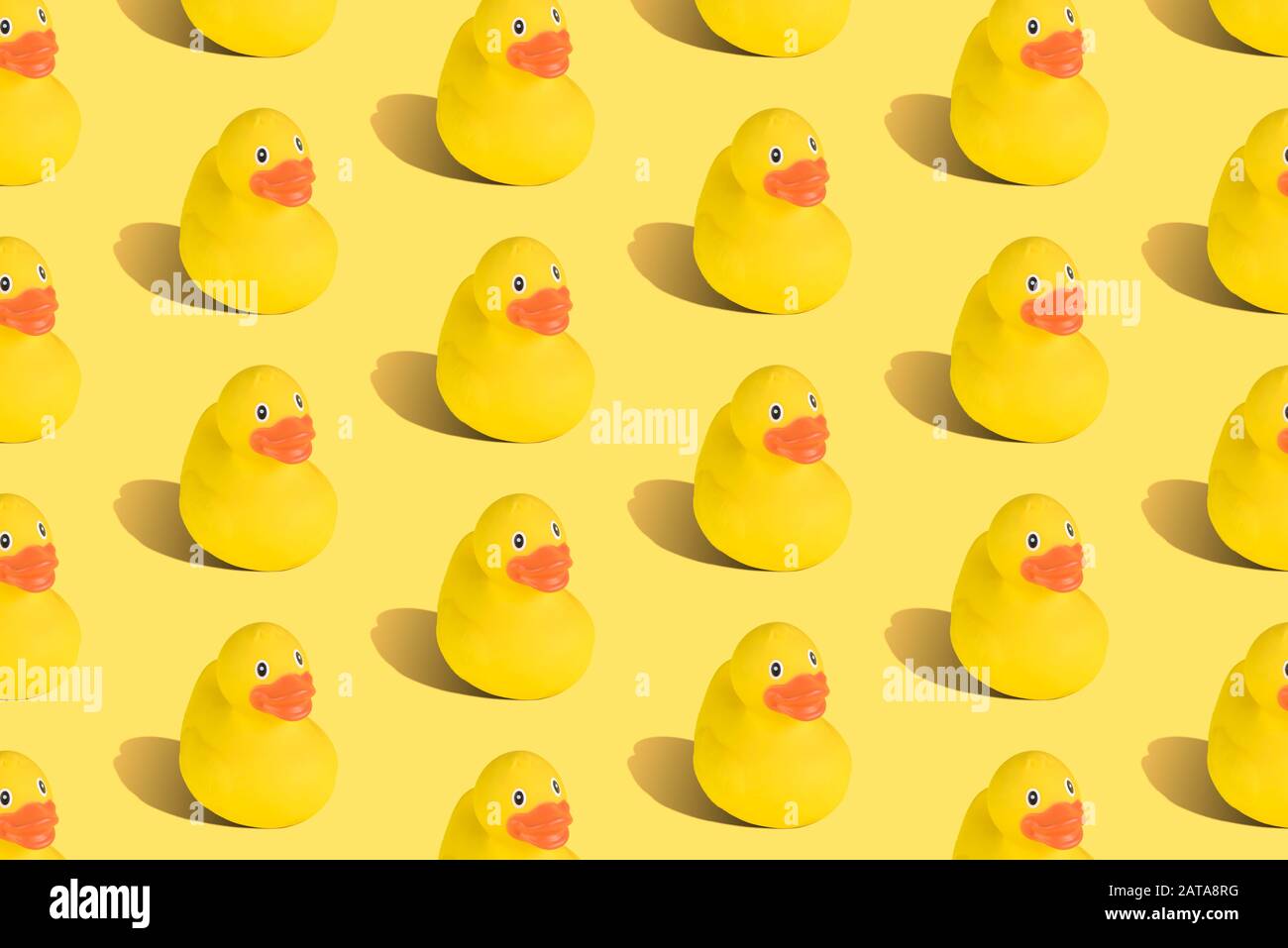Rubber duck seamless pattern on yellow background minimal creative concept. Stock Photo