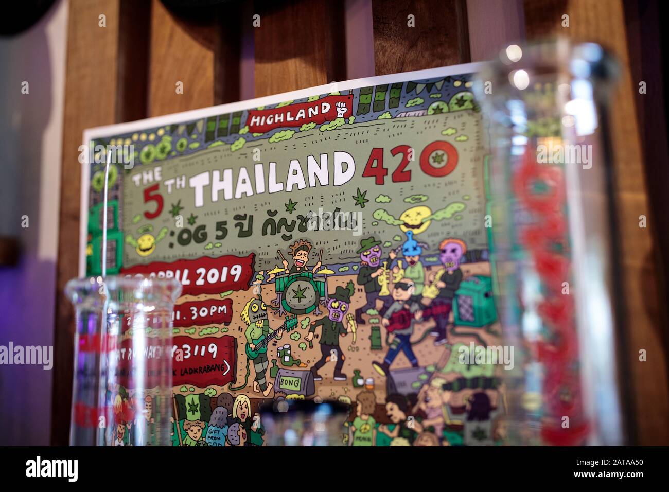 A poster for a recent weed festival on display at the cannabis-themed Highland Cafe in Bangkok, Thailand on July 30th, 2019. (Photo - Jack Taylor) Stock Photo