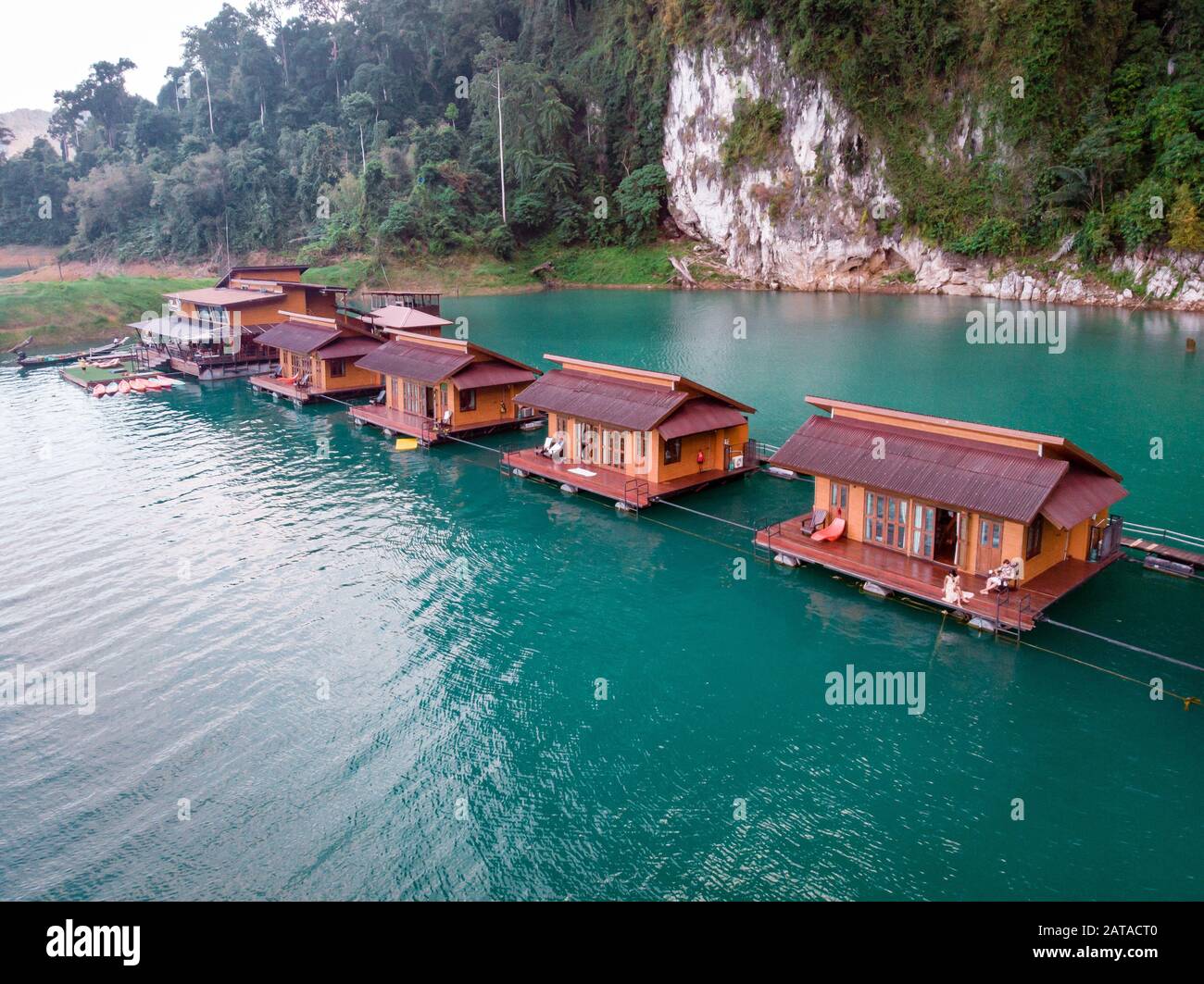 floating bungalows at Khao Sok Thailand, drone view at the lake with couple  in front of bungalow in Thailand Khao Sok Stock Photo - Alamy