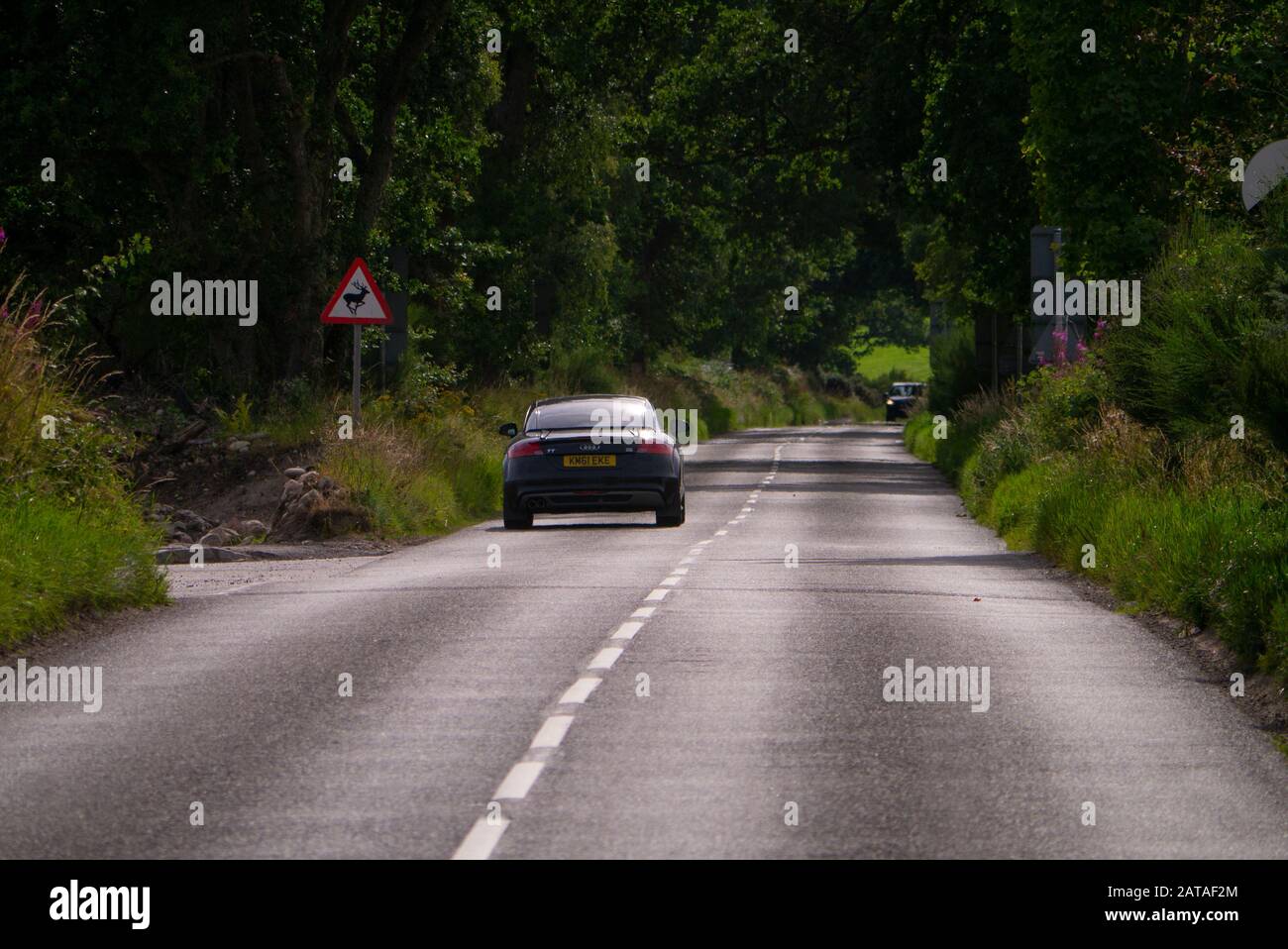 Traffic on the A831 near Beauly in the Scottish Highlands of Inverness-shire Scotland UK Stock Photo