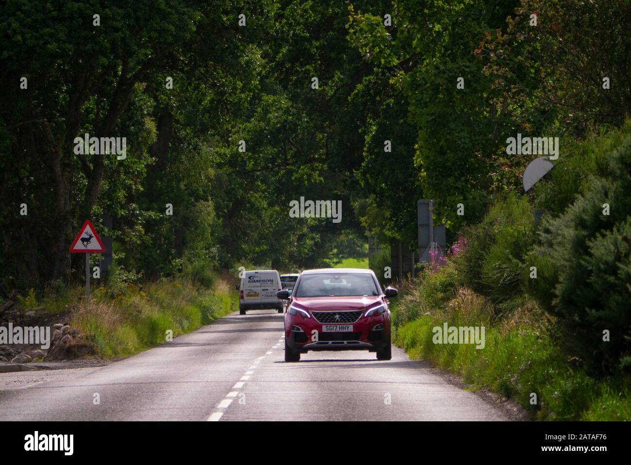 Traffic on the A831 near Beauly in the Scottish Highlands of Inverness-shire Scotland UK Stock Photo