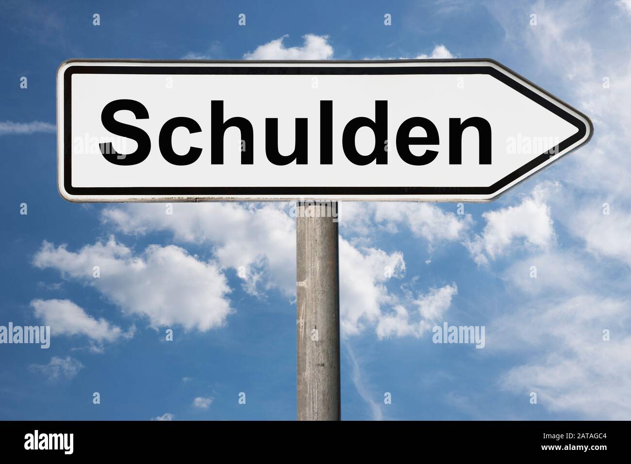 Detail photo of a signpost with the inscription Schulden (Debts) Stock Photo