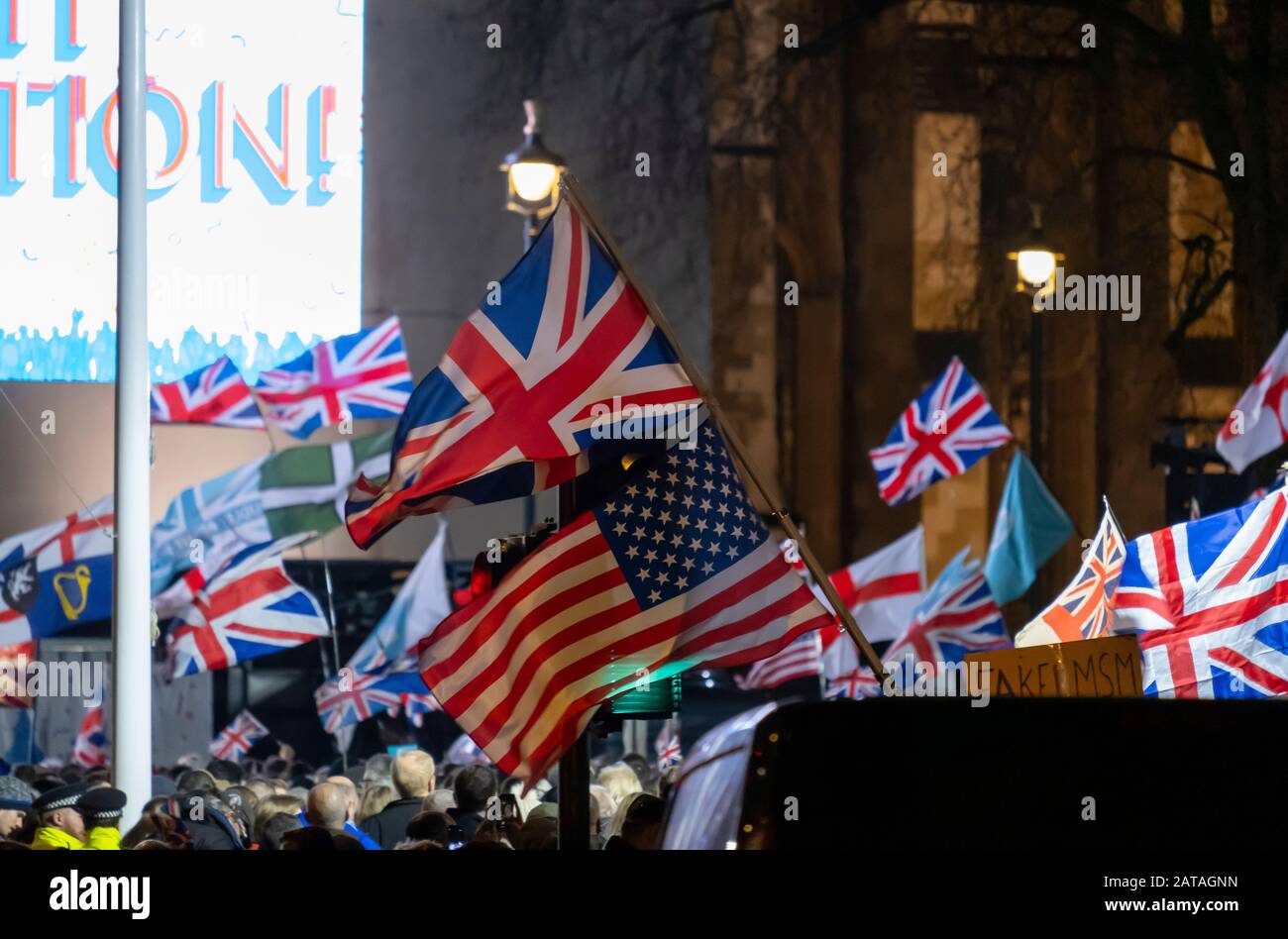 Parliament Square, London, UK. 31st January 2020. Crowds at the Leave Means Leave Brexit Celebration opposite the Houses of Parliament to mark the UK leaving the EU at 11.00pm. Credit: Malcolm Park/Alamy. Stock Photo