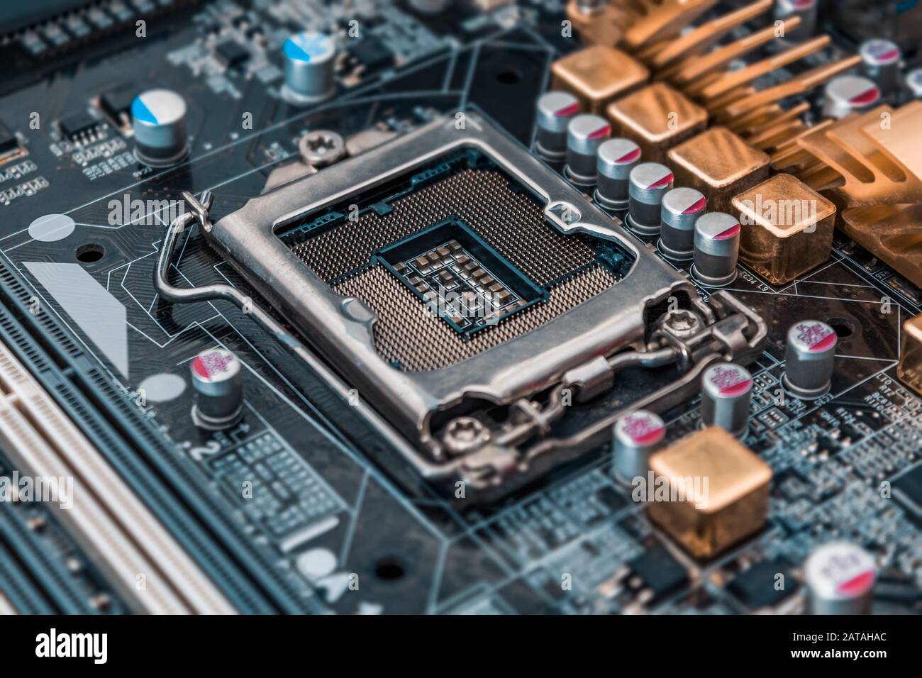 Motherboard socket its micro components and electronics elements close-up Stock Photo