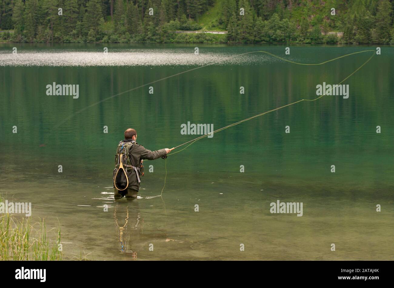 Fishing in the Anterselva Lake (Antholzer See), Osttirol, Trentino Alto Adige, Italy Stock Photo