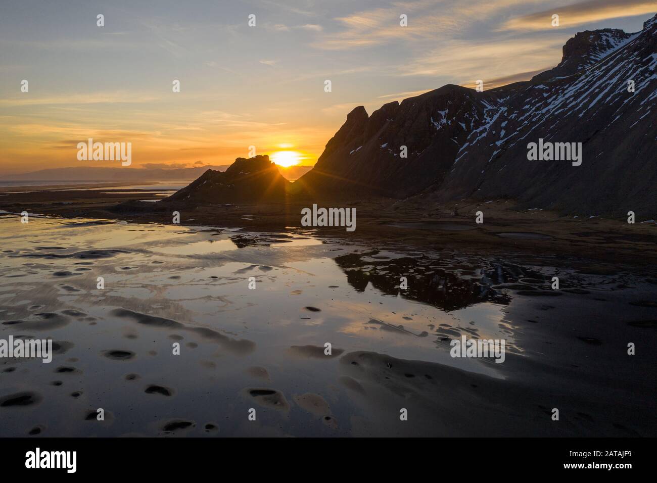 Aerial view of Vestrahorn mountains and Stokksnes beach during sunset. Iceland in early spring Stock Photo