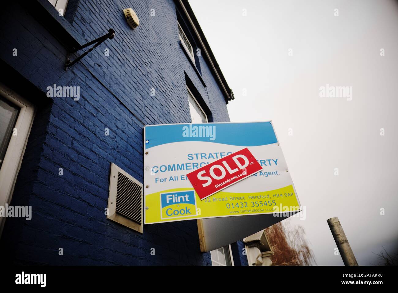 Commercial property with an estate agents SOLD sign in Hereford UK 2020 Stock Photo