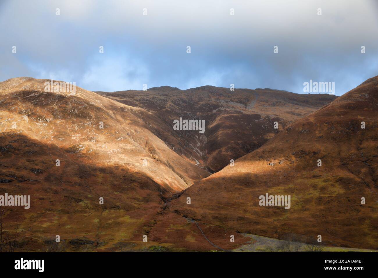Scottish Highlands near Invergarry lit by sun, Scotland, UK Stock Photo