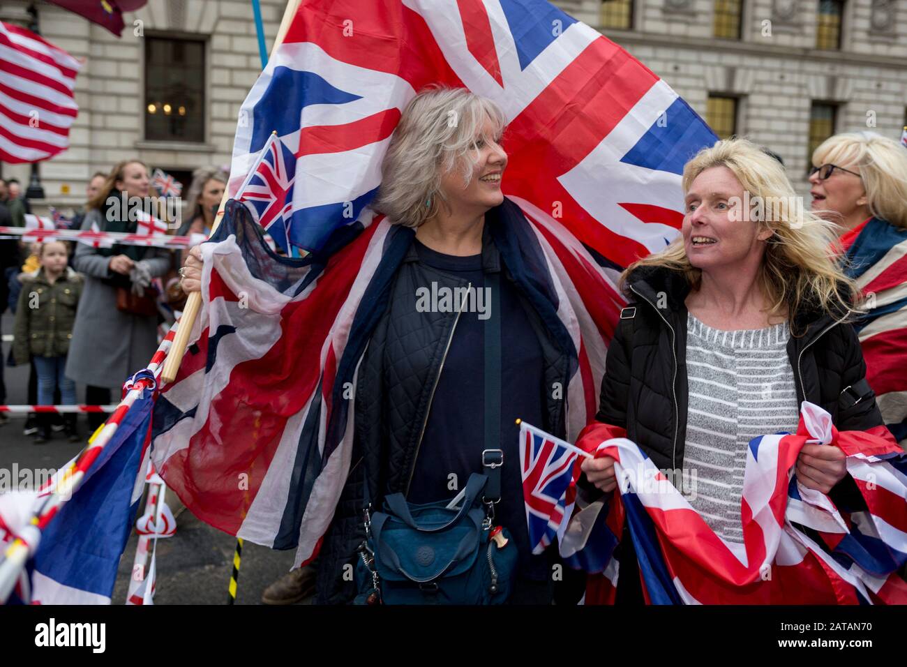 After threee and a half years of political upheavel in the British parliament, Brexiteers celebrate in Westminster on Brexit Day, the day when the UK legally leaves the European Union, on 31st January 2020, in London, England. Stock Photo