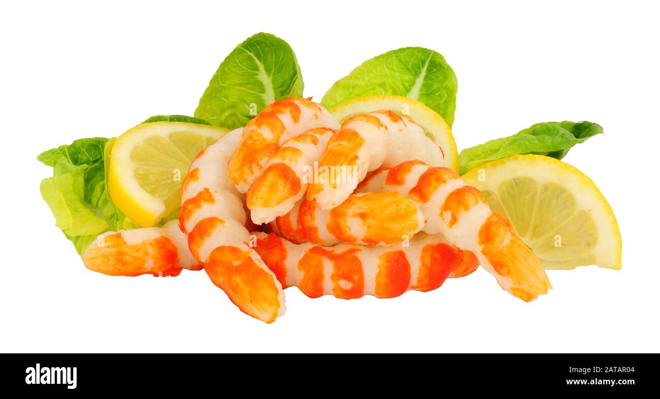 Fish protein surimi formed into prawn shapes isolated on a white