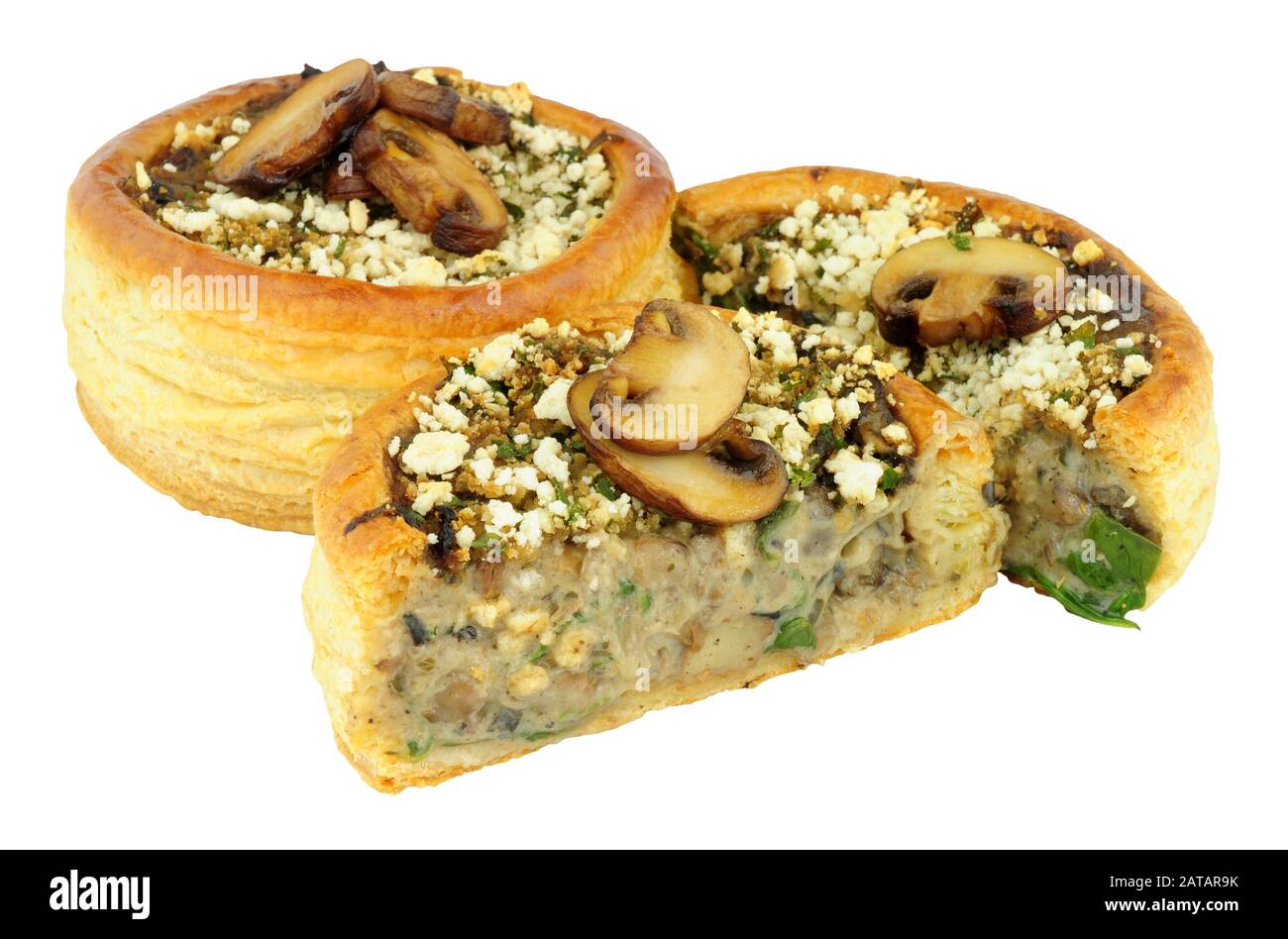 Mushroom and spinach filled vol au vent isolated on a white background
