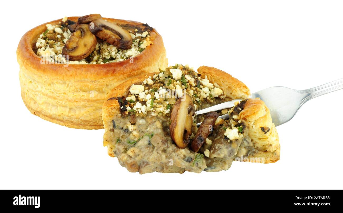 Mushroom and spinach filled vol au vent isolated on a white background