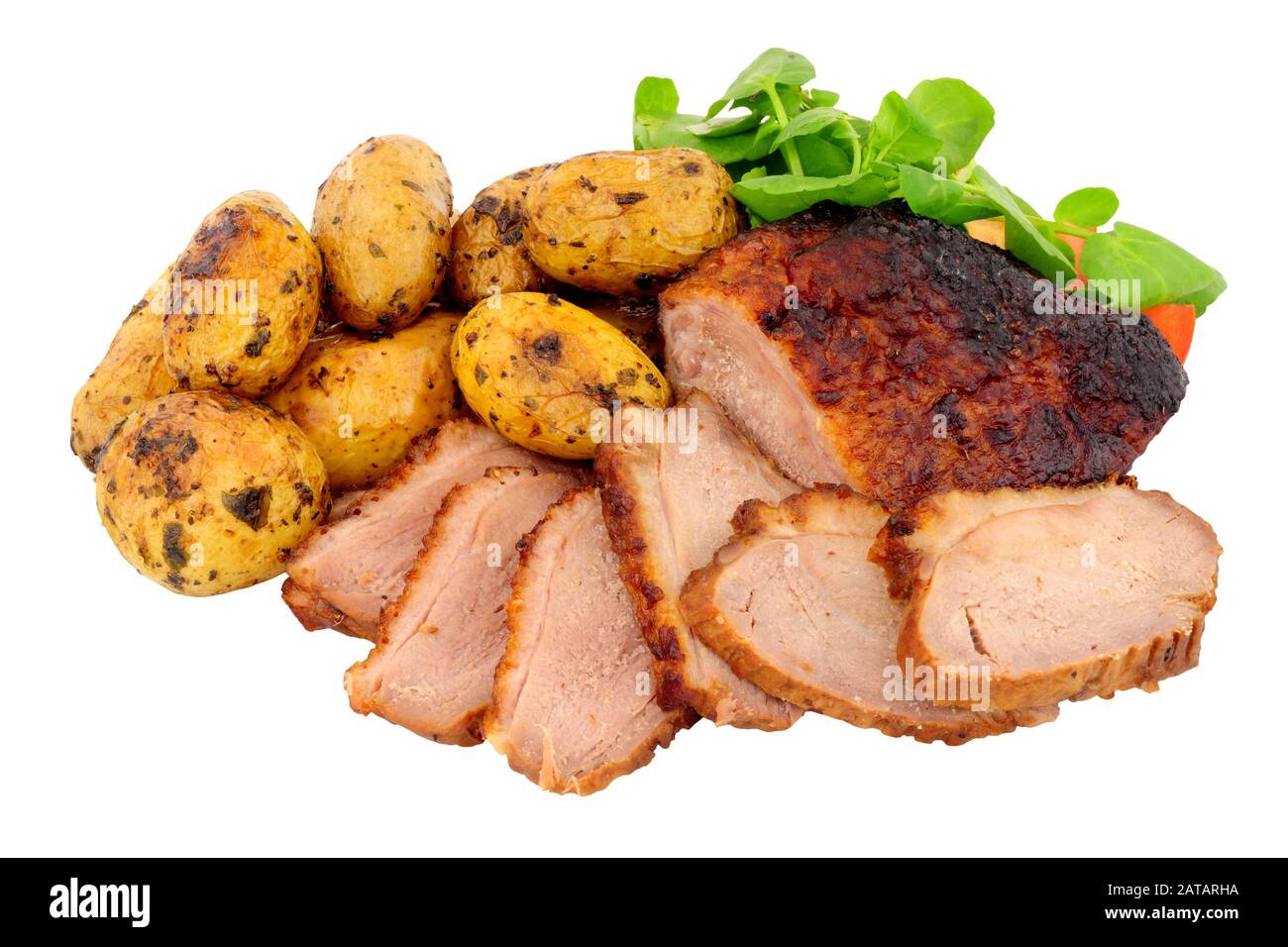 Roast duck meal with roasted potatoes isolated on a white background