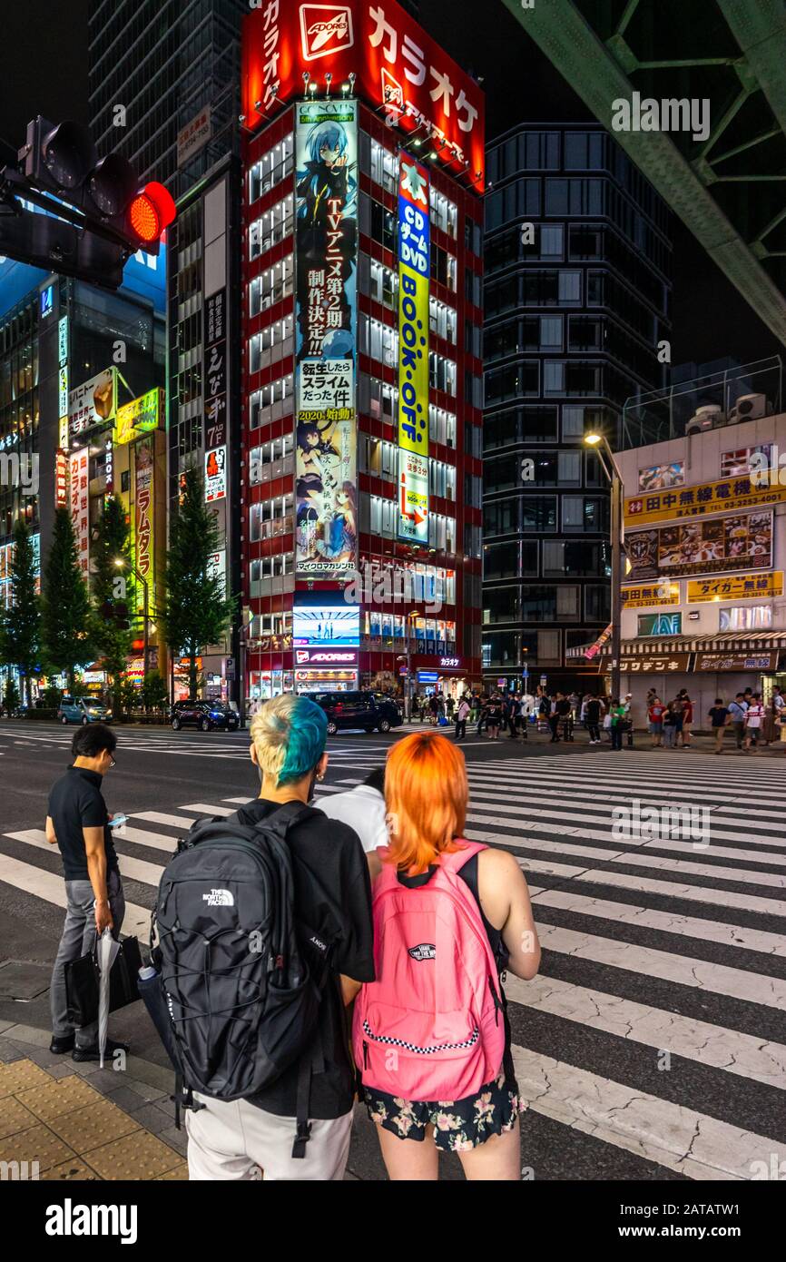 Tokyo, Japan, August 13, 2019 – Two youngsters at Akihabara, a Tokyo's district full of electronics and manga shops Stock Photo