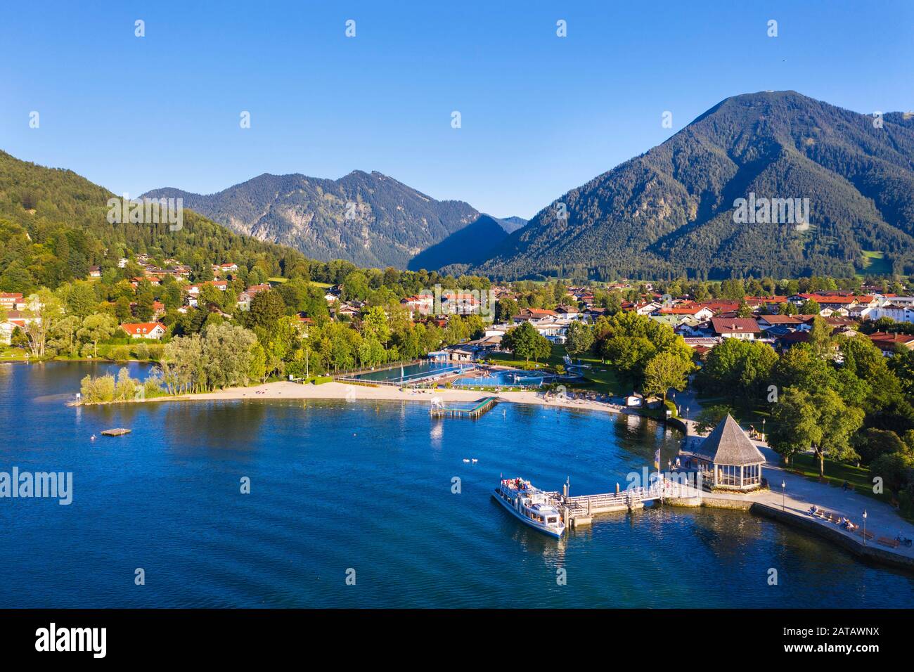 Passenger boat at the landing stage and open-air swimming pool Rottach-Egern at Lake Tegernsee, on the right Wallberg, drone shot, Upper Bavaria Stock Photo