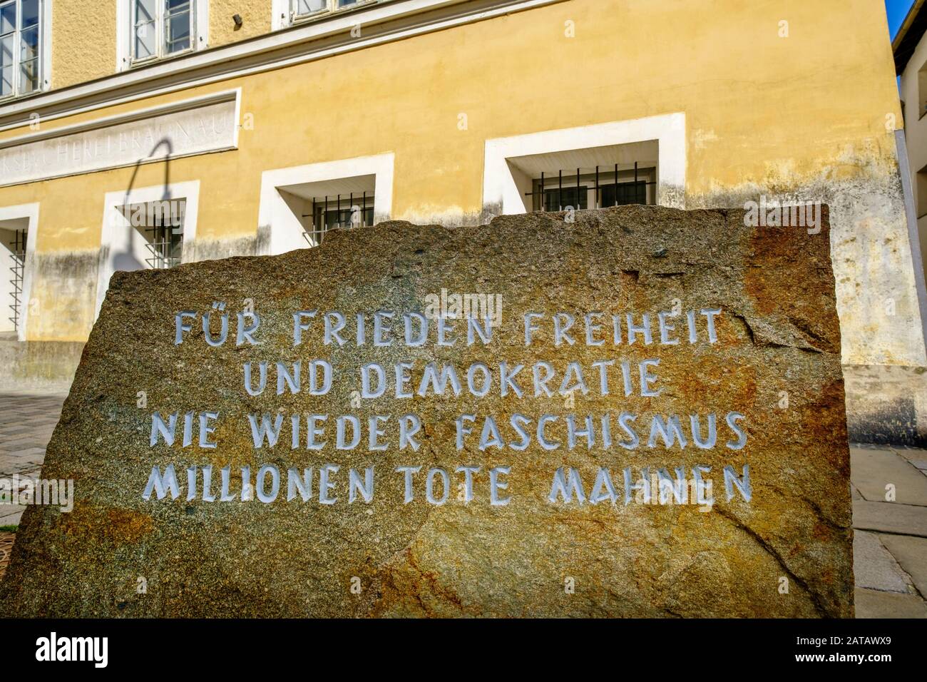 Reminder in front of the birthplace of Adolf Hitler, Braunau am Inn, Innviertel, Upper Austria, Austria Stock Photo