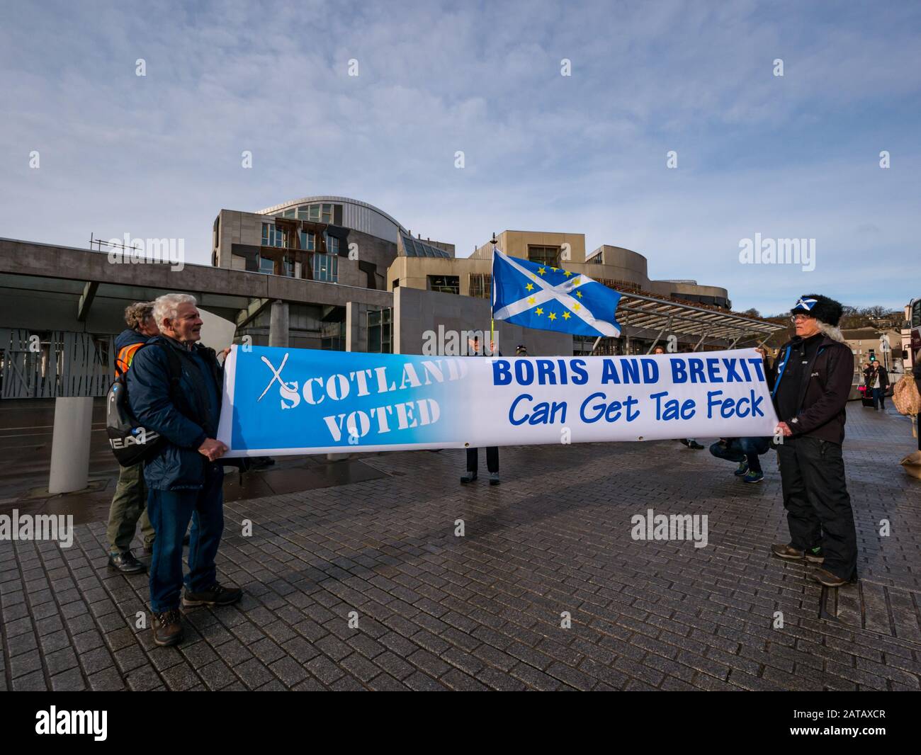 Anti-Brexit protestors at Scottish parliament on Brexit Day with banner against Boris and Brexit, Holyrood, Edinburgh, Scotland, UK Stock Photo