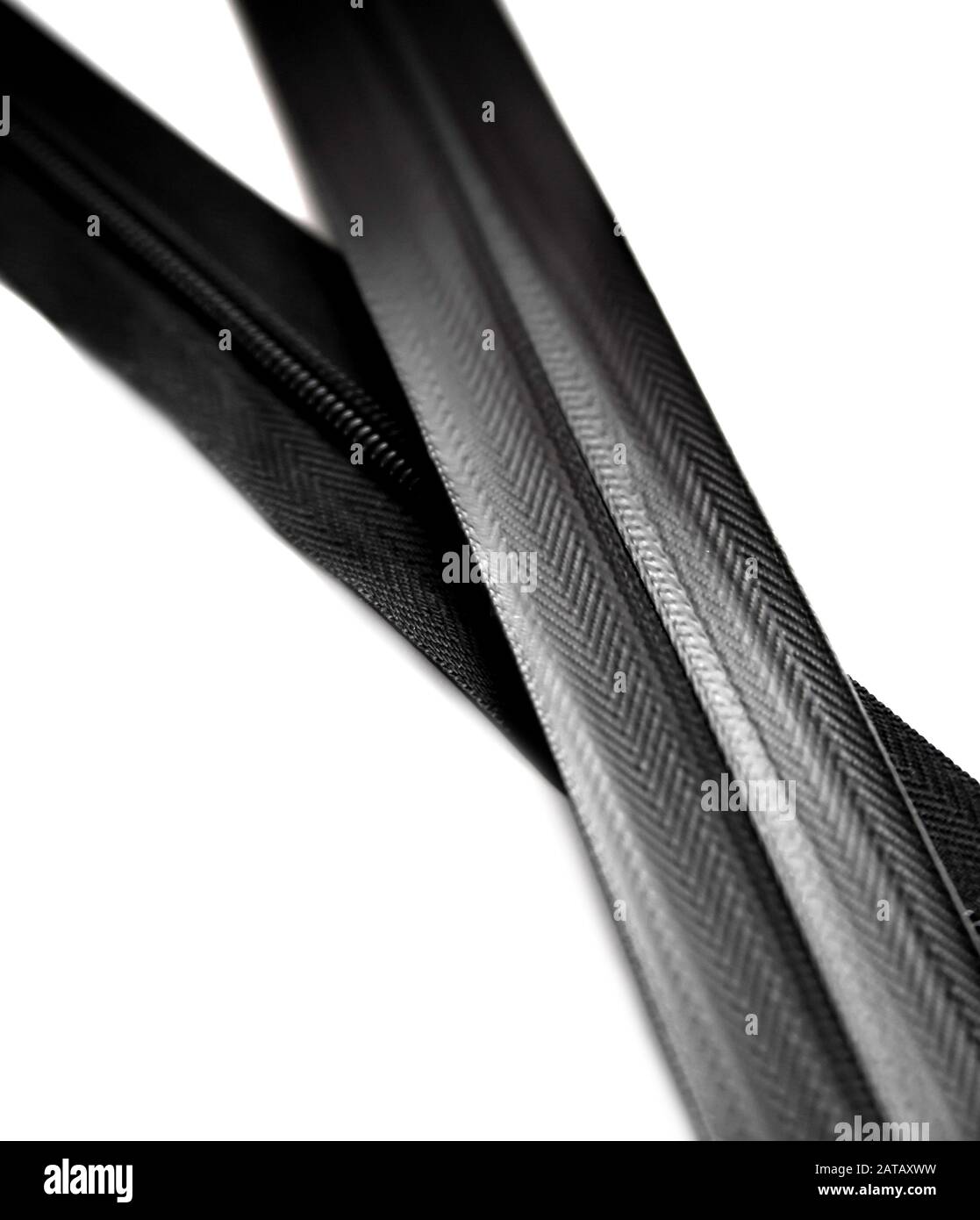 Black waterproof zipper closeup isolated on white background Stock Photo