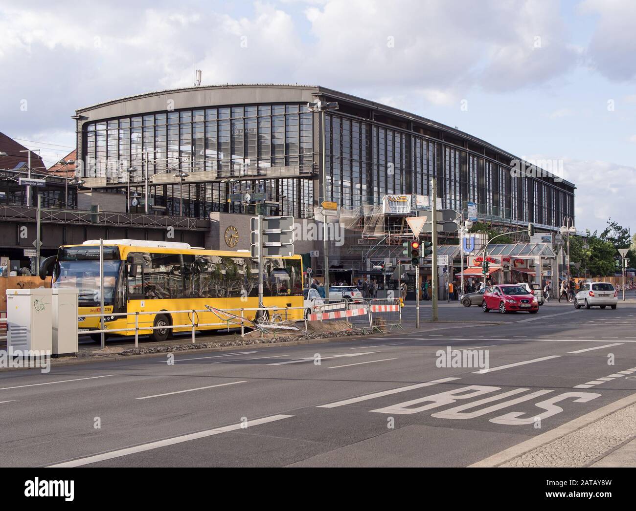 BERLIN, GERMANY - JULY 6, 2016: Bahnhof Zoo, central station with a yellow city bus Stock Photo