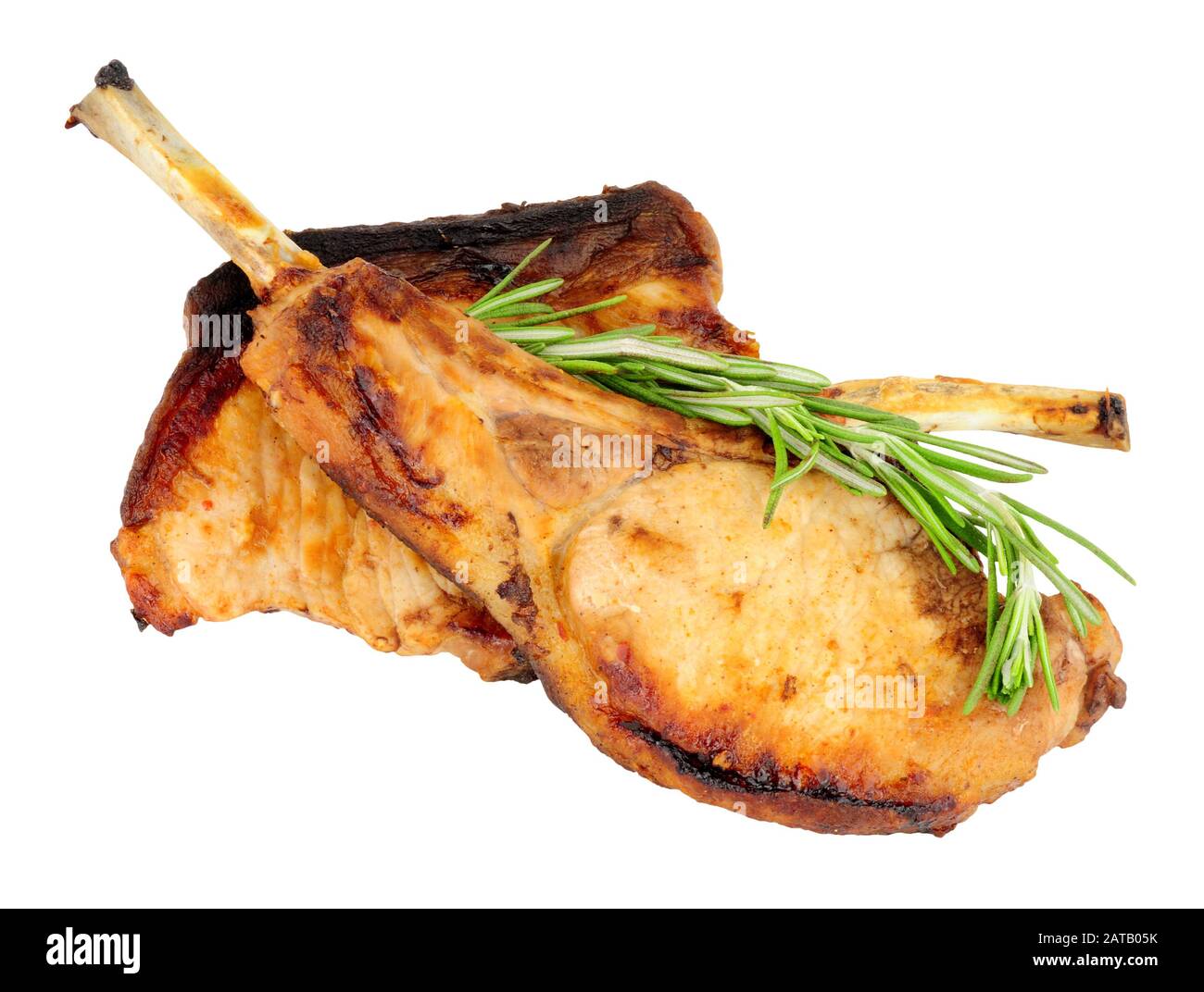 Two grilled tomahawk pork chops isolated on a white background Stock Photo