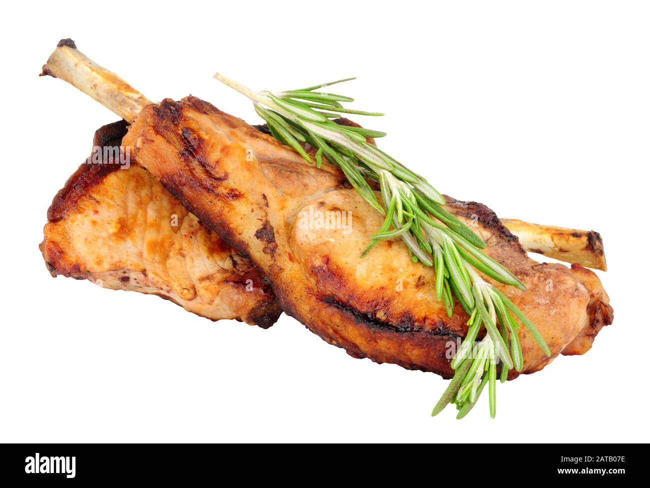Two grilled tomahawk pork chops isolated on a white background Stock Photo