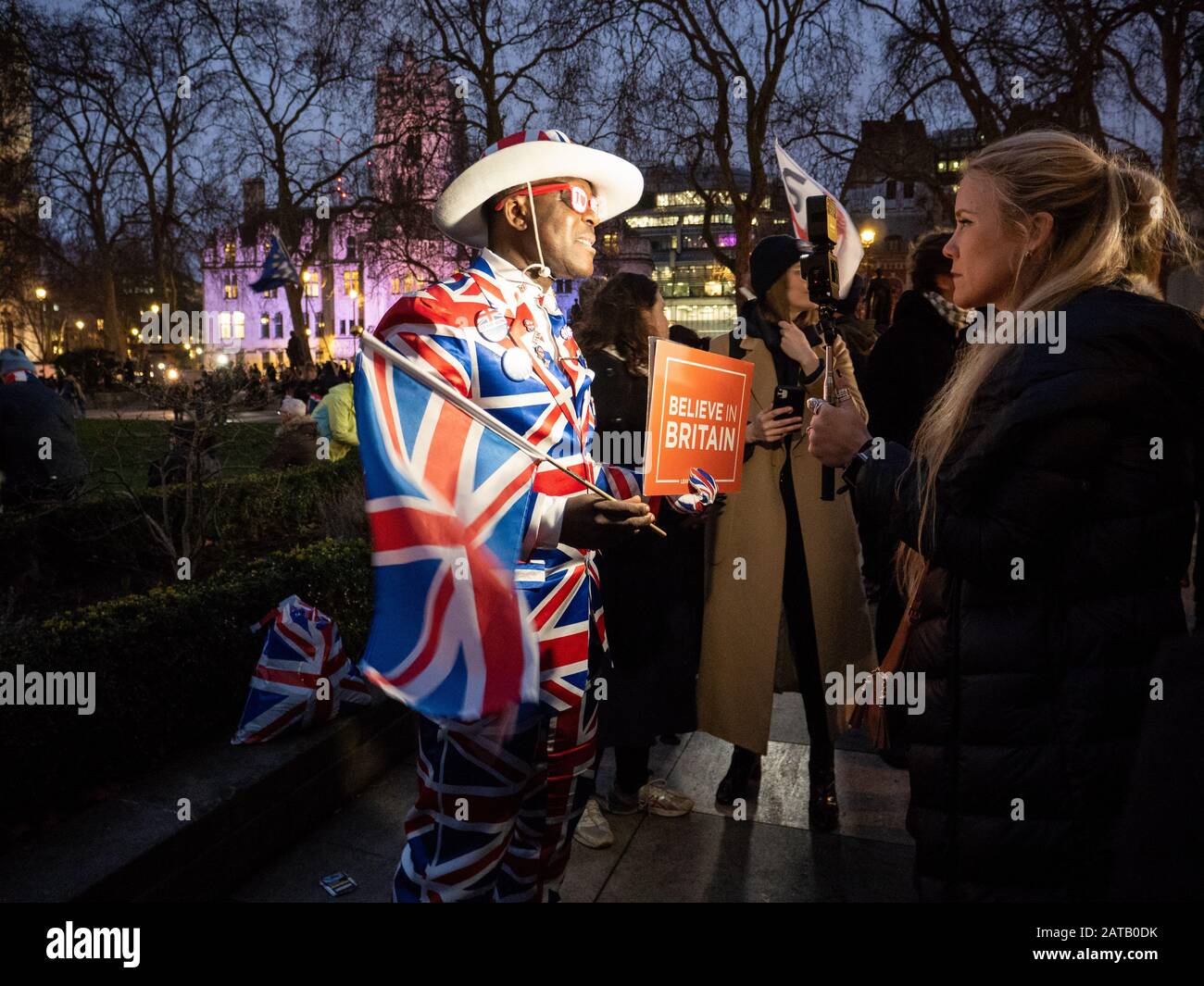 Brexit day 31st Jan 2020 in Parliament square, London, England. Man in Union Jack costume is interviewed. Stock Photo