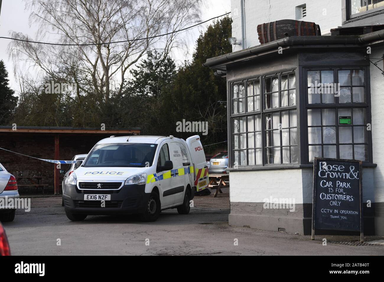 Police outside the Rose and Crown pub in Writtle, Essex, after a man, named locally as Liam Taylor 19, was fatally stabbed outside the pub on Friday. Four men have been arrested on suspicion of murder following the assault. Stock Photo