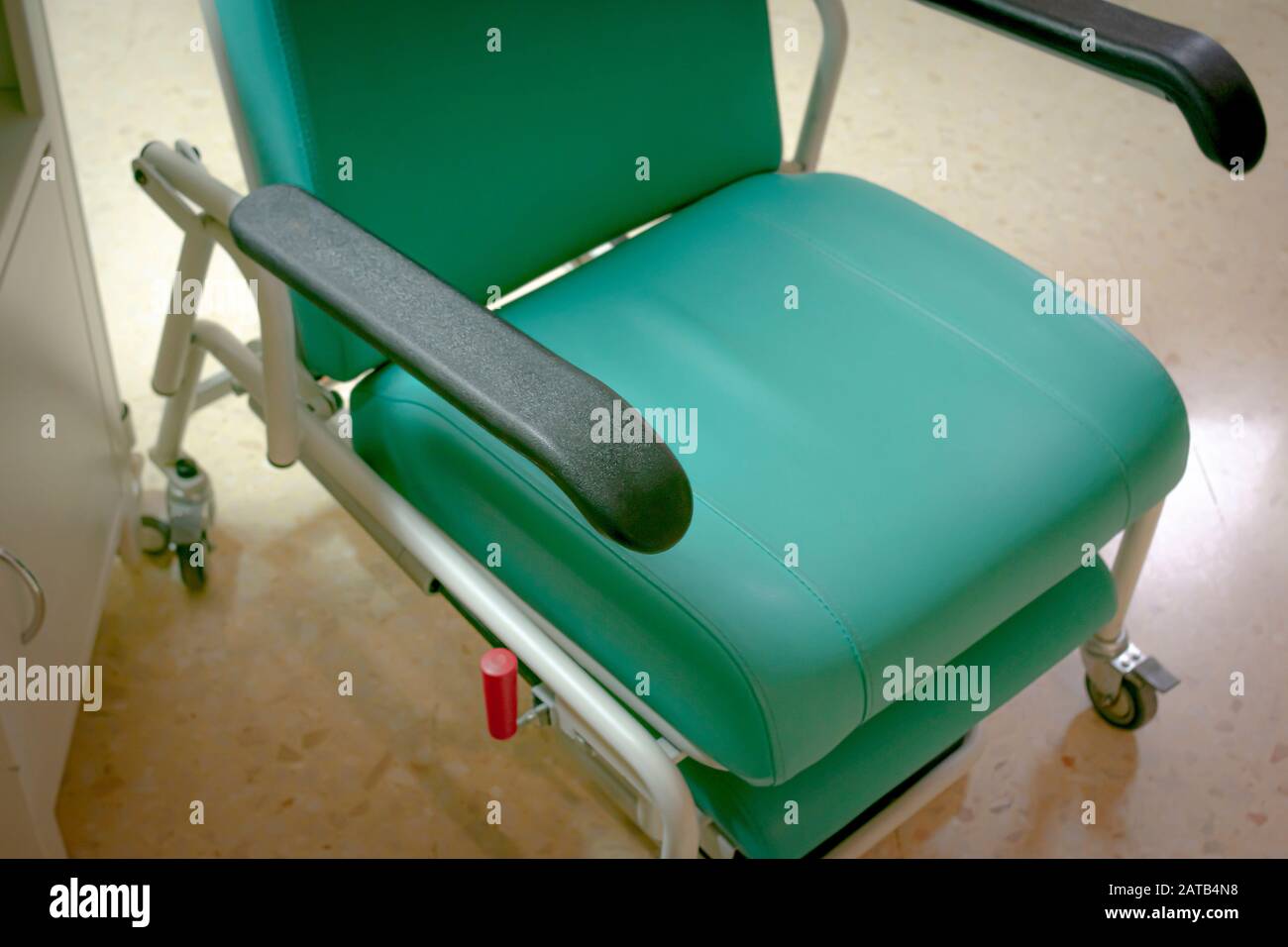 Chair of a hospital room to accompany patients while they are hospitalized Stock Photo