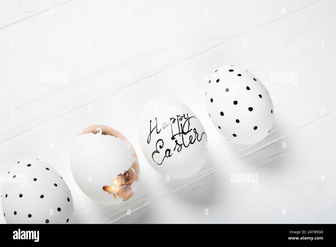 Easter eggs on a white wooden background. Stock Photo
