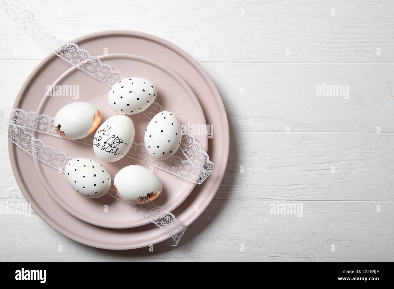 Easter eggs on a plate. Easter. Place for text Stock Photo