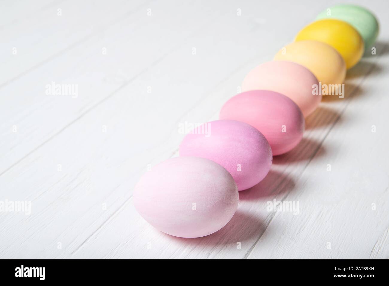 A row of multi-colored Easter eggs Stock Photo
