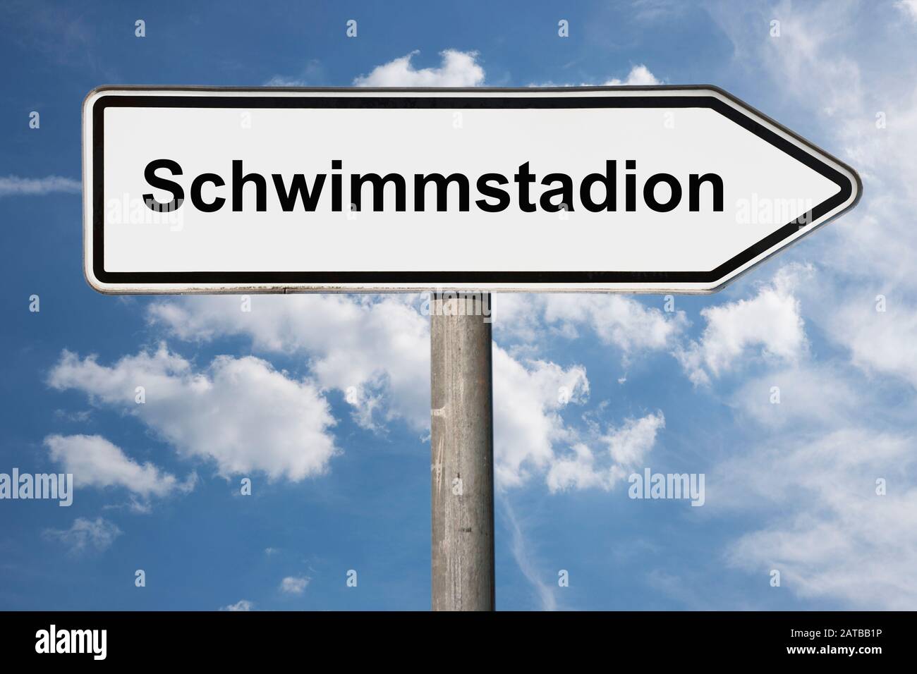 Detail photo of a signpost with the inscription Schwimmstadion (Swimming stadium) Stock Photo