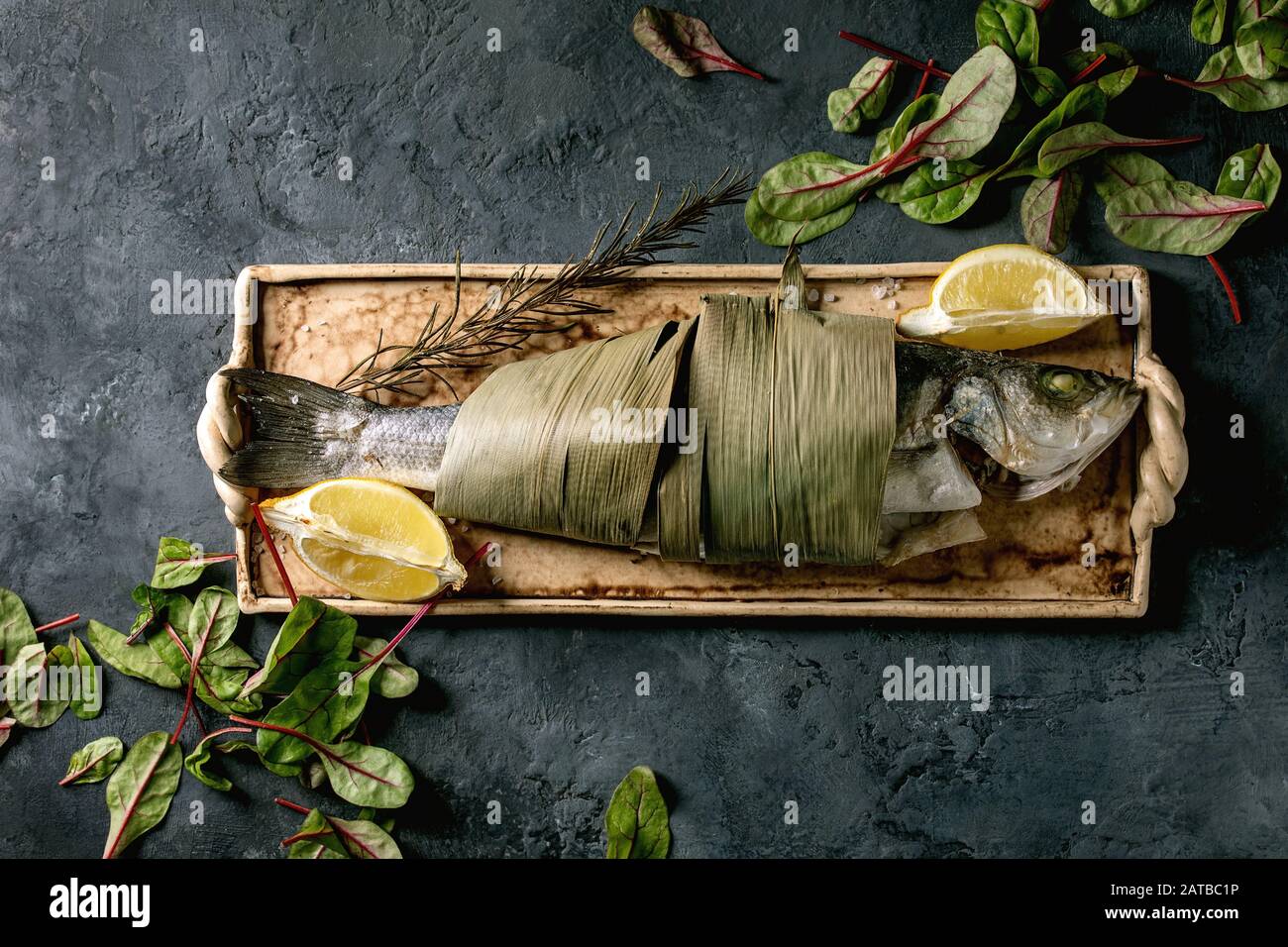 Baked fish sea bass Stock Photo - Alamy