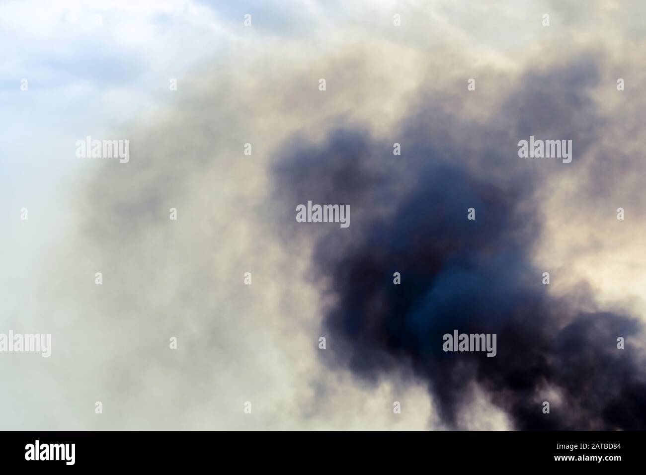 Exhaust pipe of ferry boat with black thick smoke coming out and sky ...