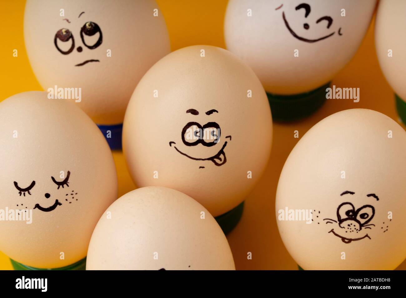 Group of chicken eggs with various emotions Stock Photo