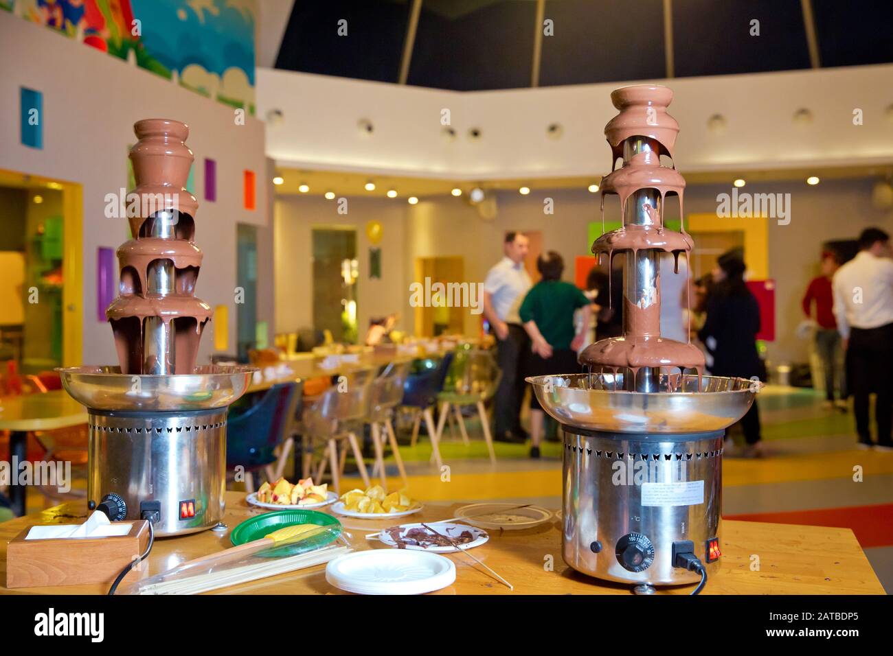Chocolate fountain with fruits. Children birthday party . Homemade chocolate fountain fondue