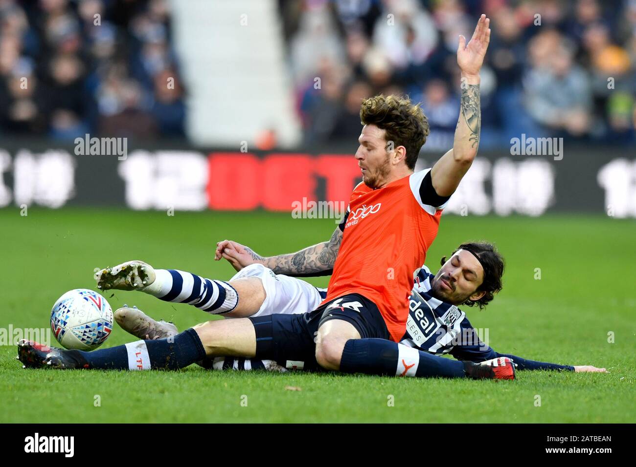 Luton Town S Glen Rea Is Tackled By West Bromwich Albion S Filip Krovinovic During The Sky Bet Championship Match At The Hawthorns West Bromwich Stock Photo Alamy