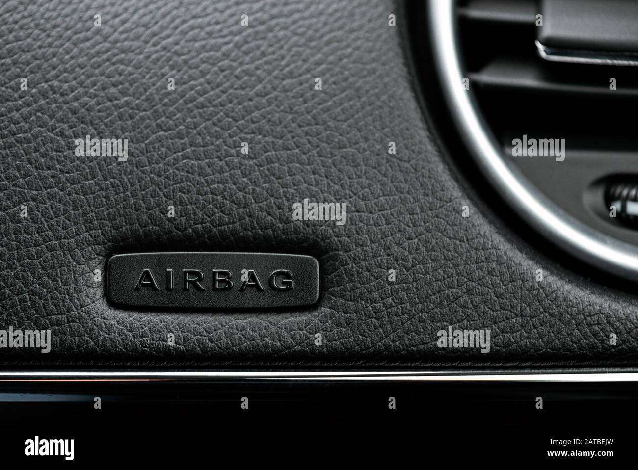 Close up image of the airbag  on the steering wheel of a car.- Image Stock Photo