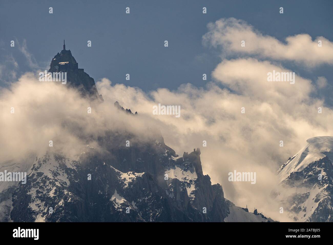 The Aiguille du Midi is a mountain in the Mont Blanc massif within the ...