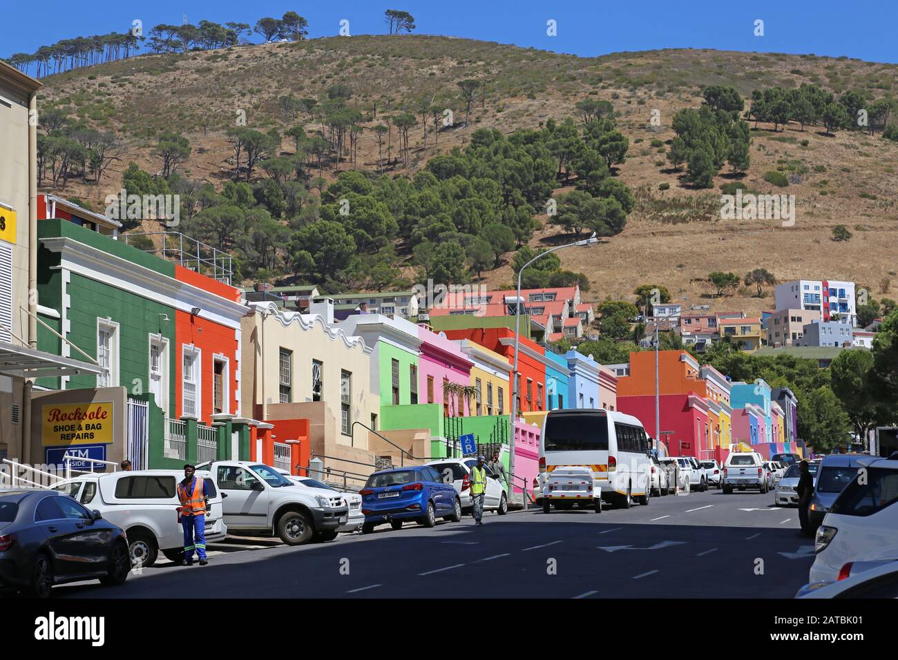 Brightly painted houses, with Signal Hill beyond, Wale Street, Bo Kaap, Cape Town, Table Bay, Western Cape Province, South Africa, Africa Stock Photo