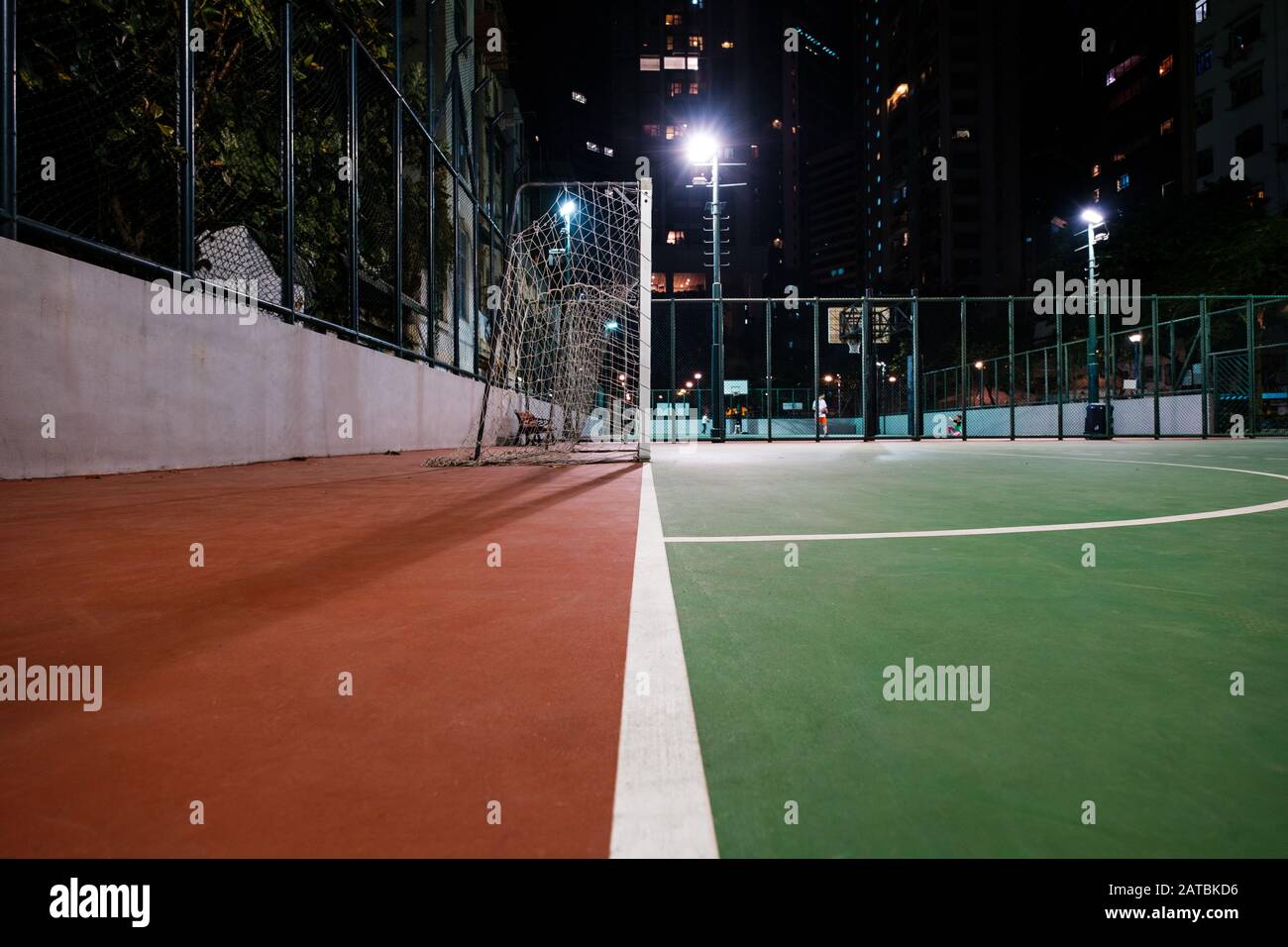 soccer court in city, sports field at night - Stock Photo