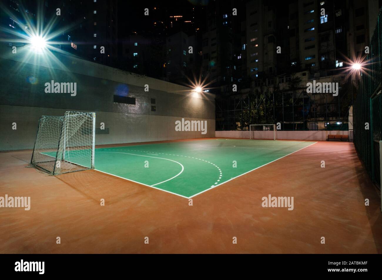 soccer court in city, sports field at night - Stock Photo