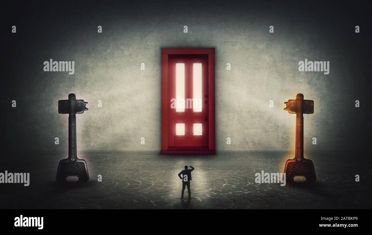 Dilemma Concept Man Has Two Options Choosing The Magic Key To Unlock The Gigantic Door Difficult Decision Correct Choice Select Right Or Left En Stock Photo Alamy