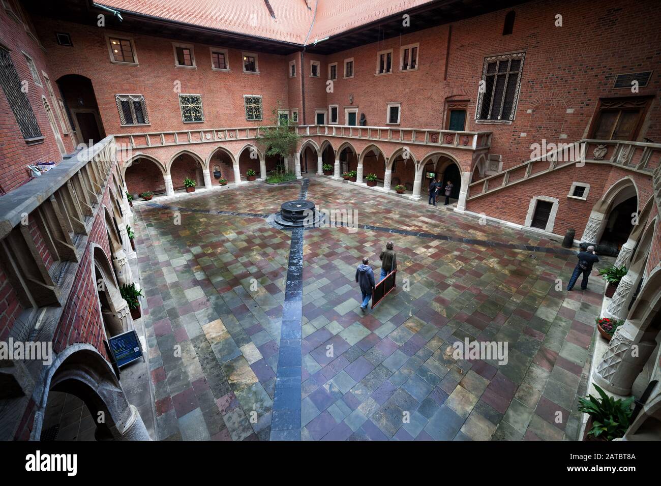 Krakow, Poland - September 24, 2018: Collegium Maius arcade courtyard, oldest building of Jagiellonian University, 15th century Gothic city landmark Stock Photo