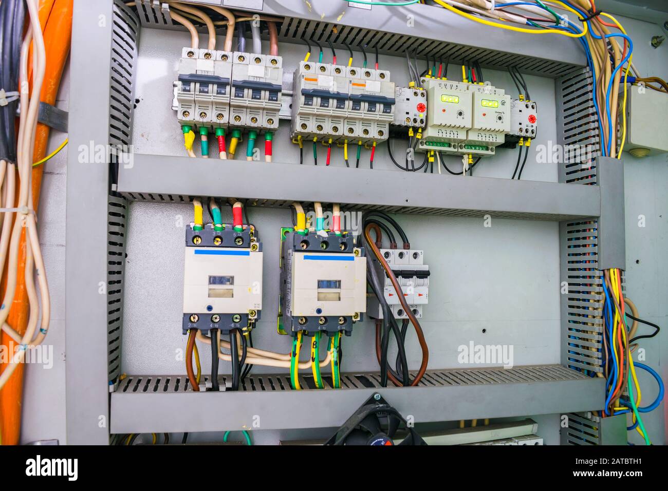fuse box with an electric relay and automatic machines. electric board and high voltage switches
