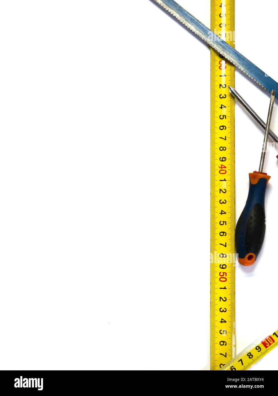 Screwdrivers and saw.Construction and repair tools Stock Photo