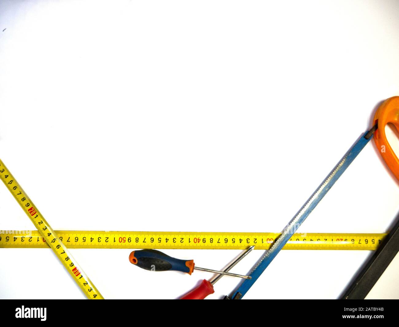 Screwdrivers and saw.Construction and repair tools Stock Photo